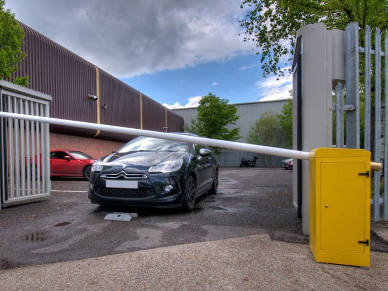 Boom barrier in use with car